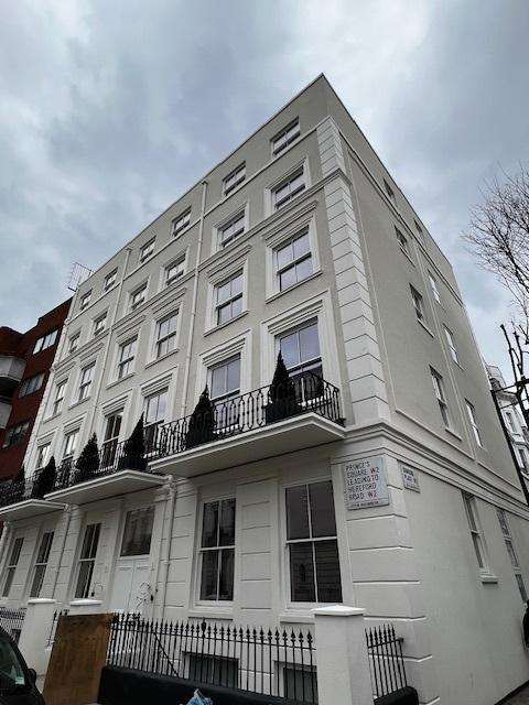 The completed stucco frontage at 74–76 Princes Square.