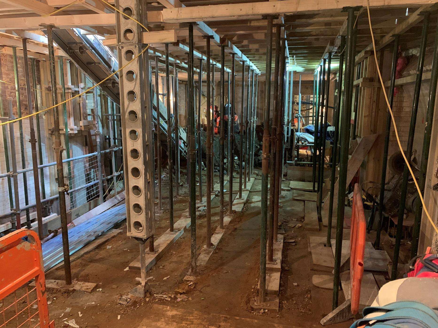 Steel columns and needles supporting the retained structure at 33 Portland Place.