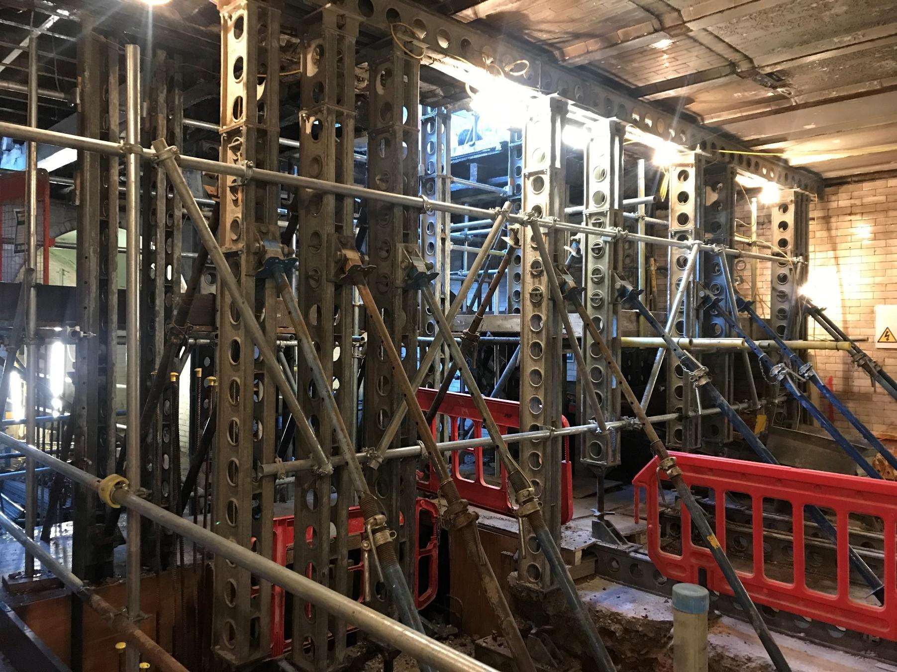 Temporary works propping installed through the principal rooms at 33 Portland Place.
